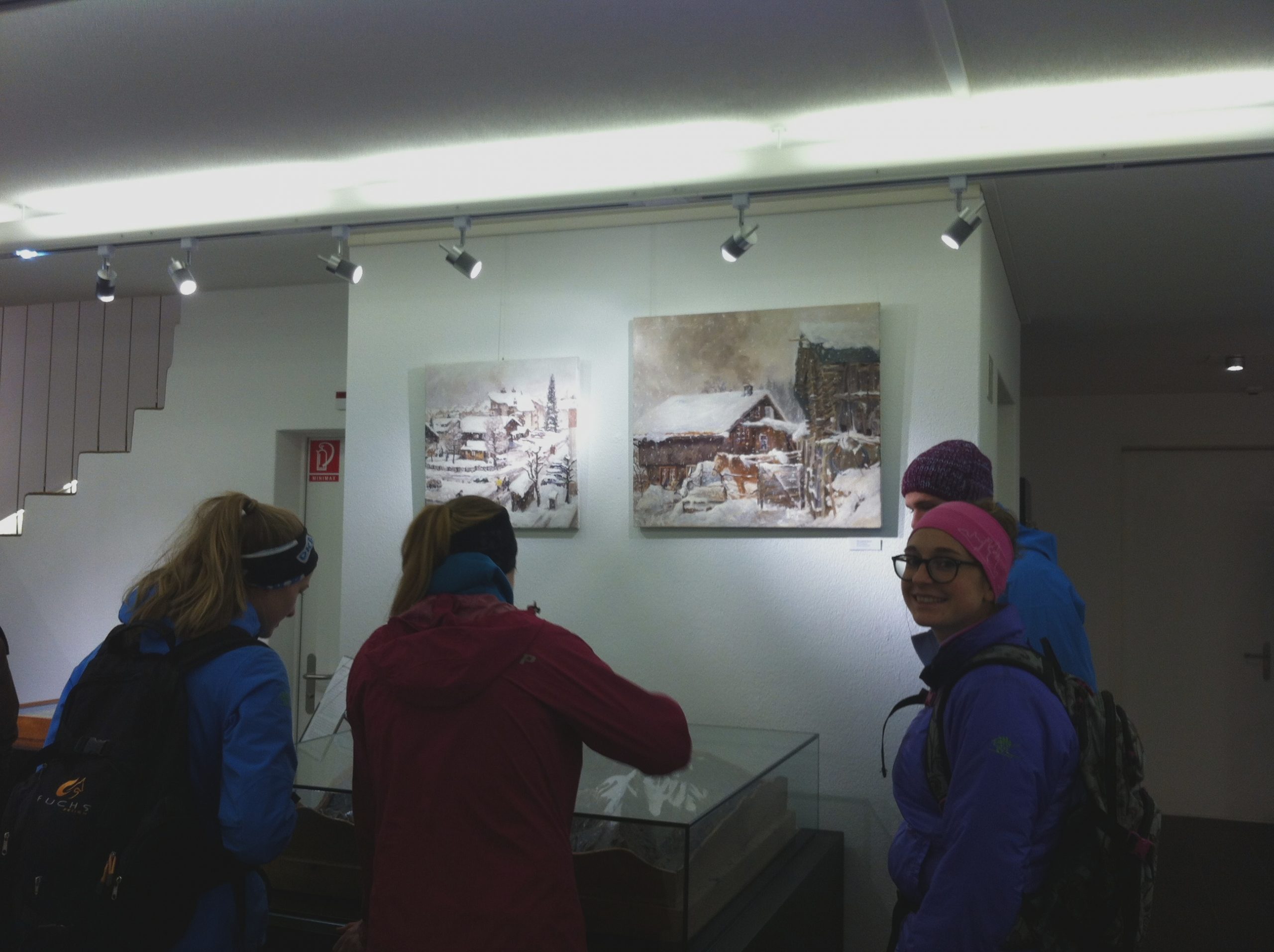 Hanging of paintings in gallery