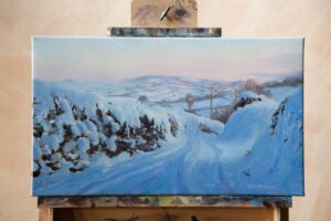 Painting of the welsh lanes and countryside covered in snow.